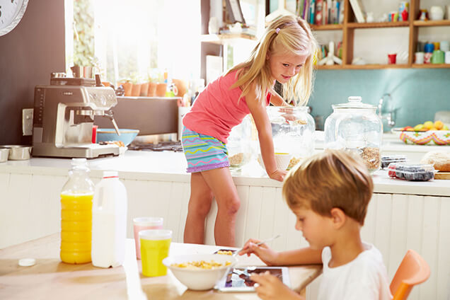 Family Eating Breakfast in the Kitchen