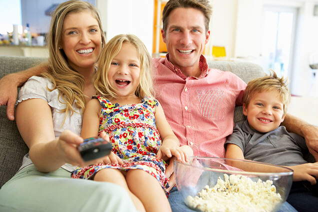 Family Watching TV Together