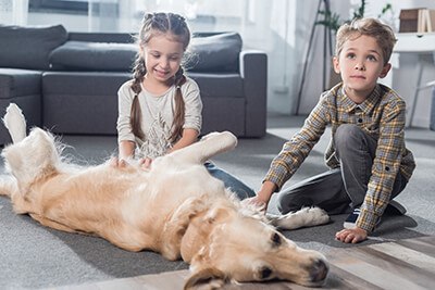 Children enjoying indoor heating