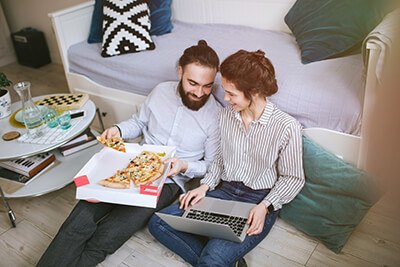 Couple enjoying heating indoors