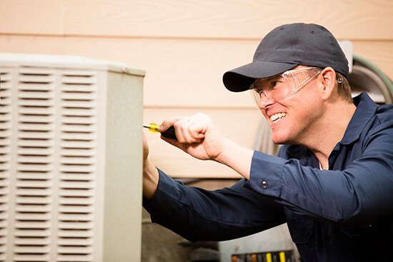 Technician Cleaning Unit In Central, PA